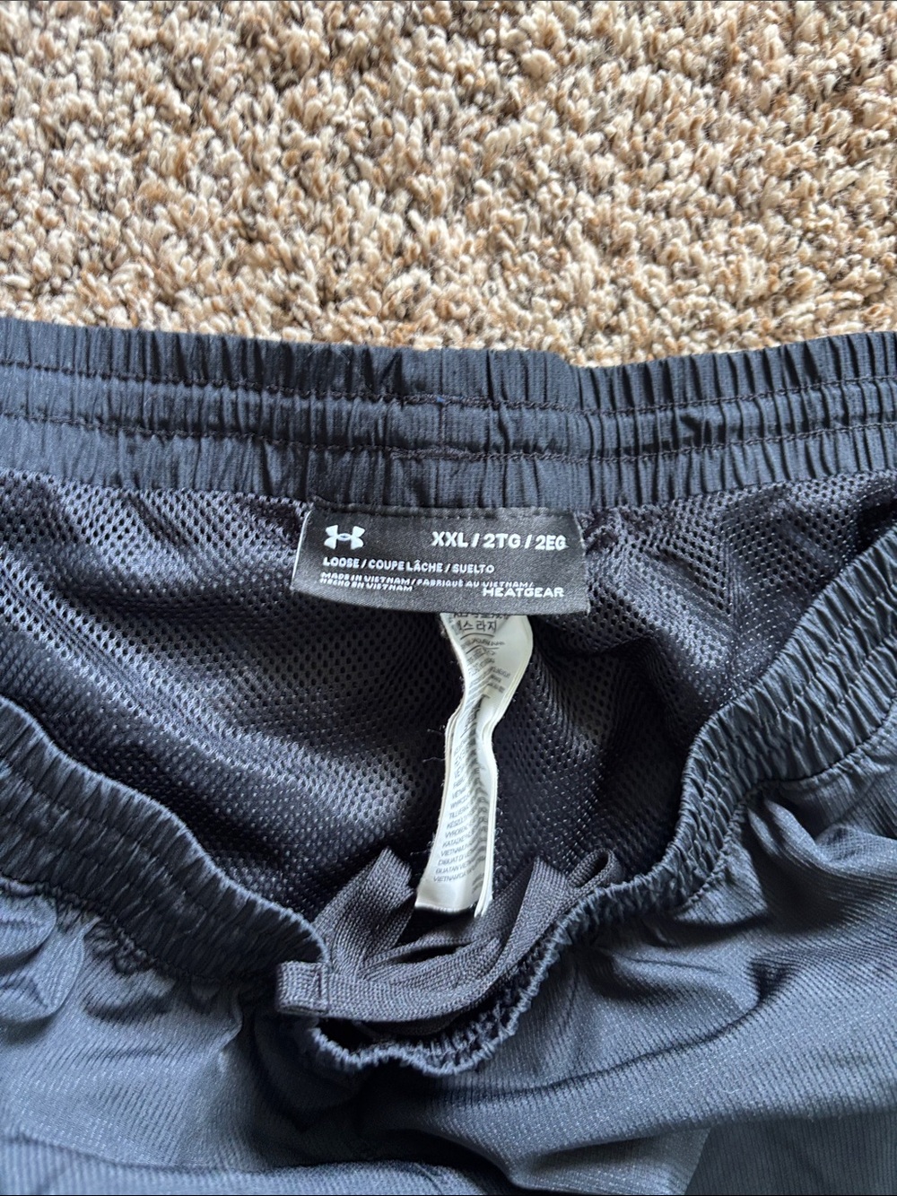 Under Armour Black Performance Mesh-Lined Lightweight Pants. Not jogger style.